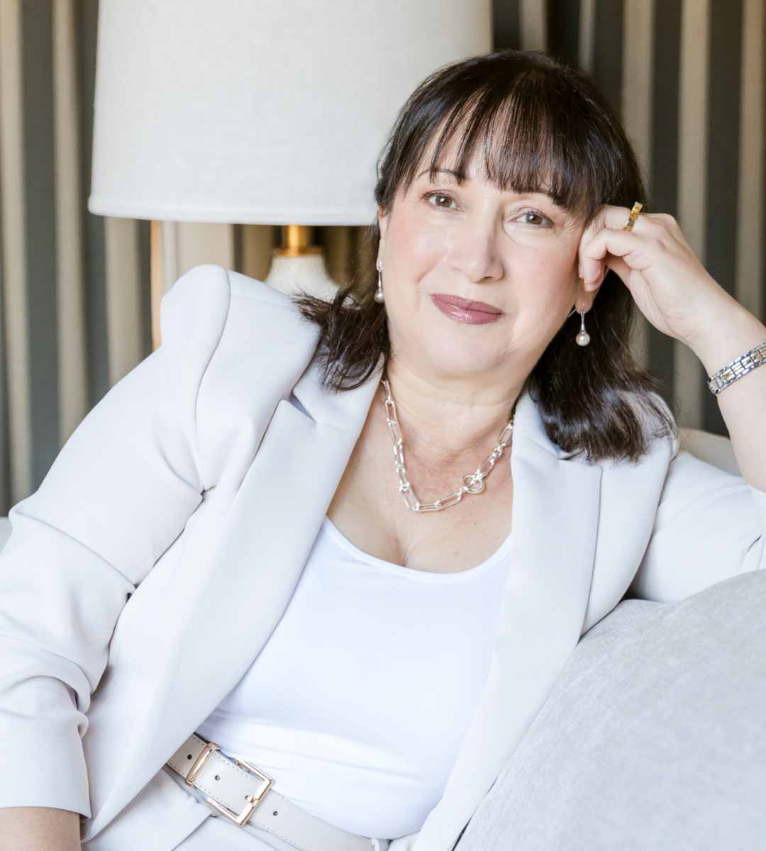 Interior designer on couch branding session